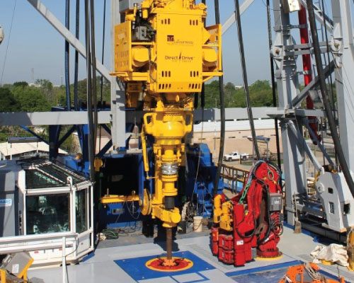 Top drive drilling equipment on a rig floor